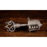 A Late 16th/17th Century Lock & Key with scroll work handle, 7 ins (18 cms) in length.