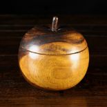 A Large Treen Lignum Apple-form Caddy/Tobacco Jar, 5 ins (13 cms) in height.