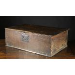 An 18th Century Boarded Oak Box (A/F), 9 ins (23 cms) high, 28 ins x 17 ins (71 cm x 43 cms).