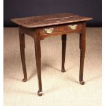 A Small George II Provincial Oak Lowboy fitted with two drawers,