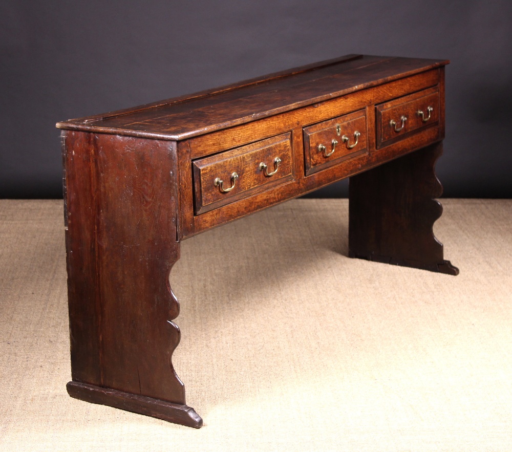 A Fine 18th Century Joined Oak Plank-End Low Dresser, Circa 1740.