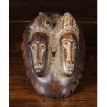 An Early 20th Century Baule Janus Mask Circa 1910-1930.