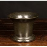 A 17th Century Dutch Bronze Mortar, 6½ ins (16.5 cms) high, 8¼ ins (21 cms) in diameter.