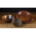 Three Turned Treen Dishes: two bowls and a platter, one 19th century bowl 2½ (6.