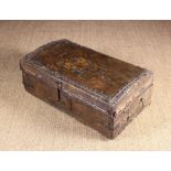 A Charles II Leather Clad Box with Ornamental Brass Studs: The domed lid dated 1679 and intialled