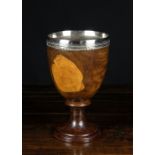 A Large & Impressive 18th Century Turned Treen Lignum Goblet having a silver metal rim band with