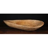 A Oval Dug-out Treen Trough, probably sycamore, 19th century, 5 ins (13 cms) high,