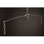 An Antique Wrought Iron Beam Balance with hooks on chains either end, 72 ins (183 cms) in width.