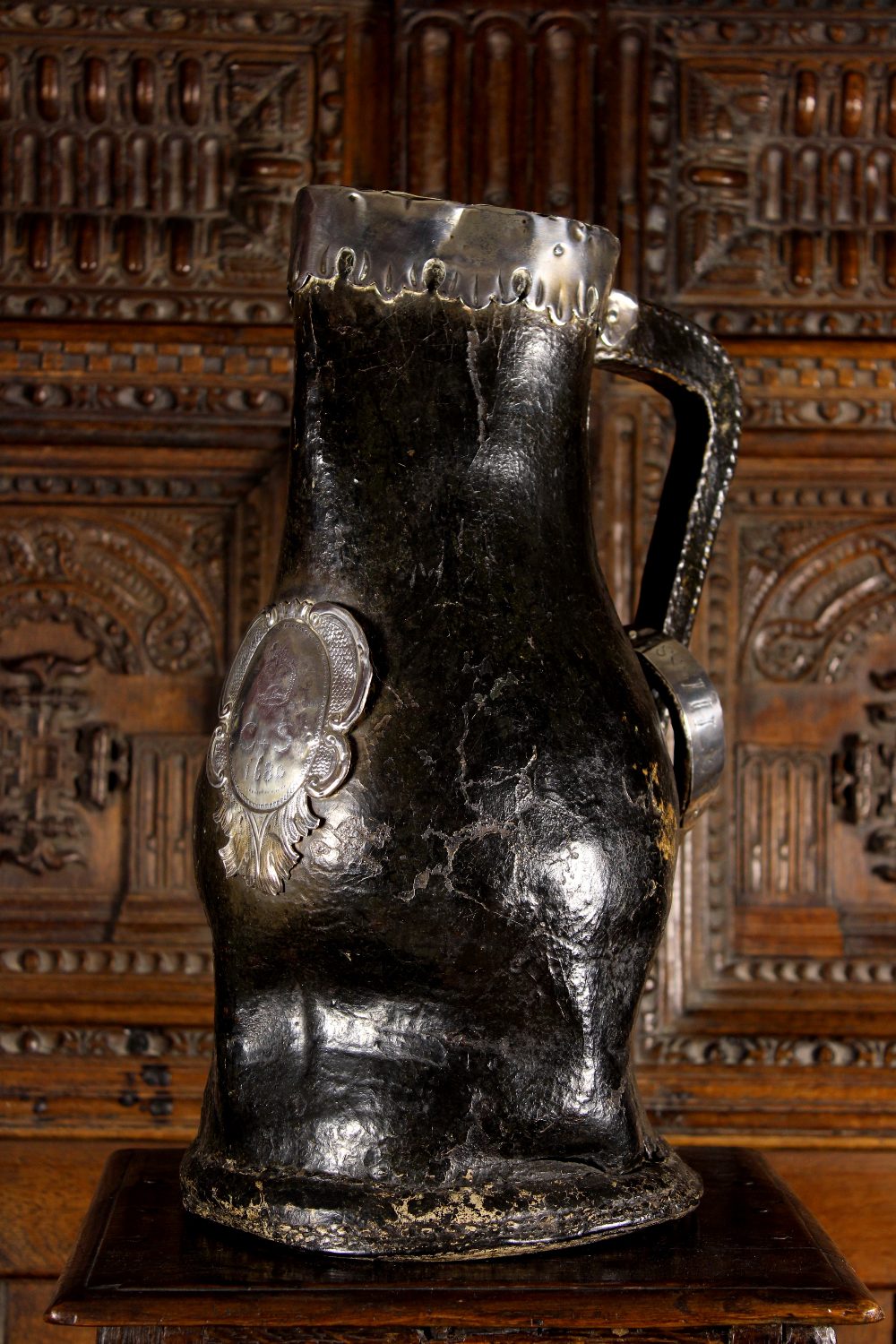 A Magnificent 17th Century English Silver Mounted Leather Bombard of impressive size and fine