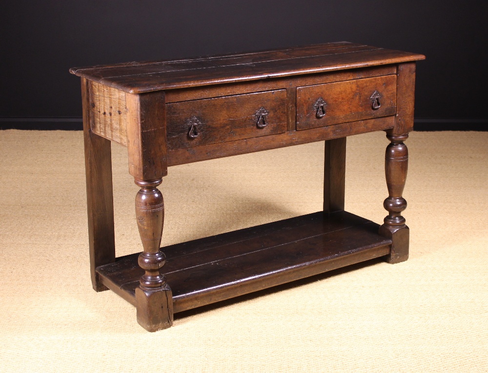 A 17th Century Oak Table of bold proportions.