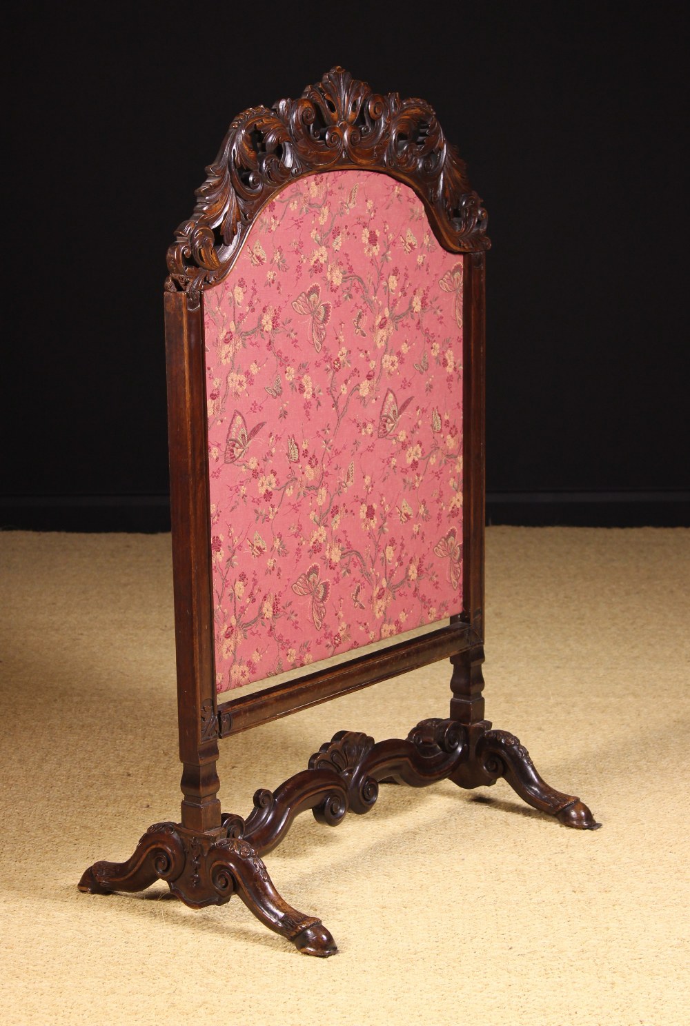 A Fine Carved Walnut Fire Screen, Circa 1720.