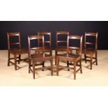 A Set of Six 19th Century Oak Bar Back Chairs with plank seats on square tapering legs.