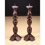 A Pair of Turned Oak Pricket Stands made from two bold 17th Century Multi-baluster turned Columns