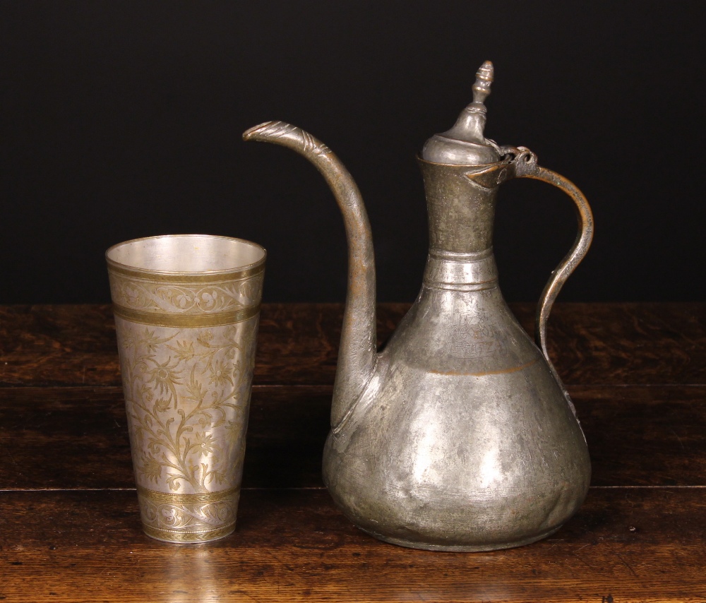 An Antique Silvered Copper Eastern Ewer inscribed and dated 1780, 12 ins (30 cms) in height,