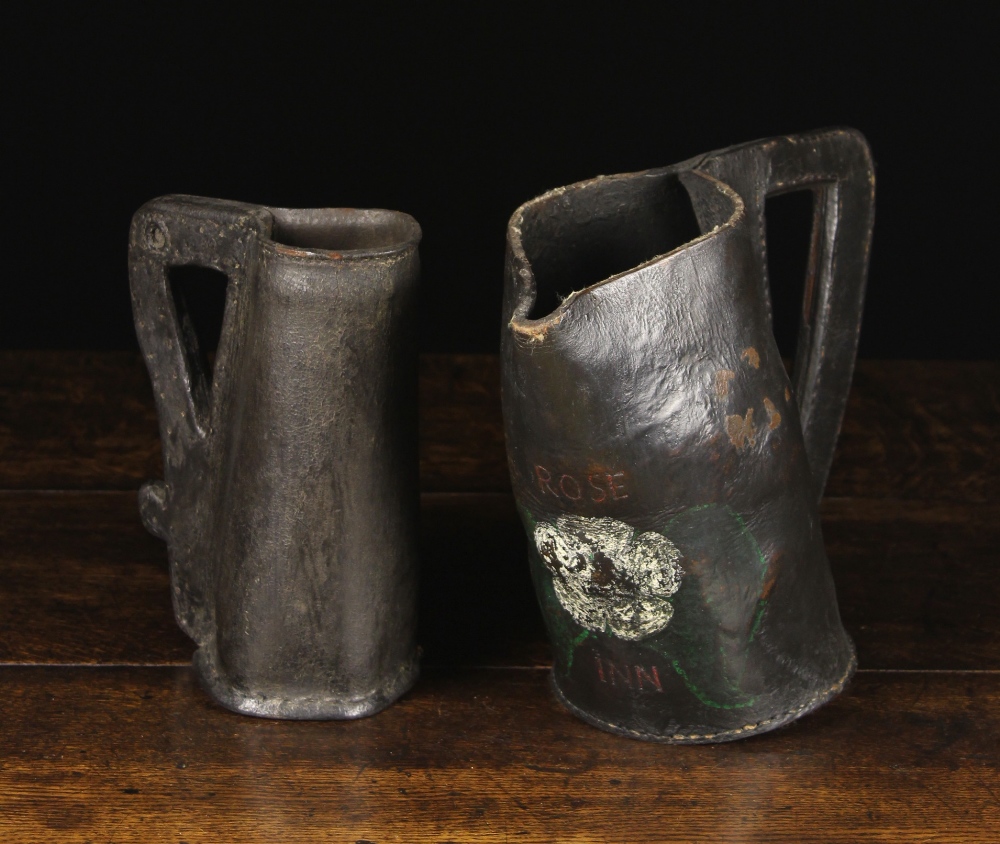 Two 18th Century Leather Black Jacks: One with a pouring spout to the sloped front,