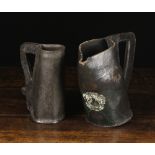 Two 18th Century Leather Black Jacks: One with a pouring spout to the sloped front,