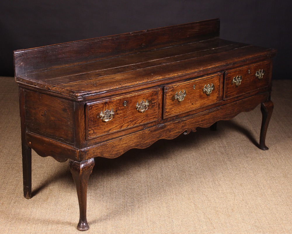 An Oak Queen Anne Low Dresser.