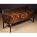 An Oak Queen Anne Low Dresser.