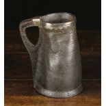 A 17th/Early 18th Century Silver Mounted Leather Black Jack.