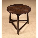 An 18th Century English Oak Cricket Table.
