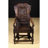 A 17th Century English Oak Wainscot Chair of fine colour & patination.