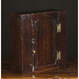 A Small 18th Century Boarded Oak Wall Cabinet of good colour and patination.