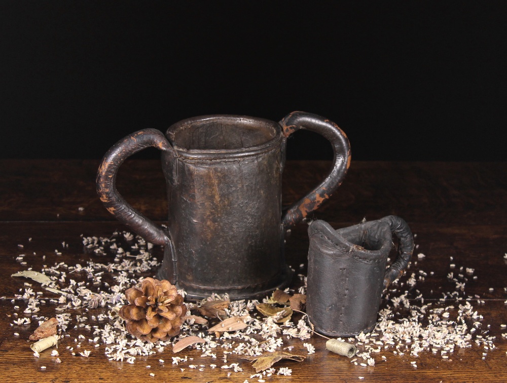 An Early 19th Century Leather Mug & Loving Mug.