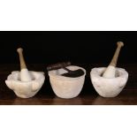 Two Marble Pestle & Mortars; the pestles with turned wooden handles;