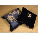 Two Cushions: One covered in midnight blue velvet centred by an appliquéd stumpwork panel