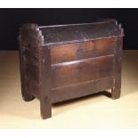 A 16th or 17th Century Riven Oak Clamp-fronted Meal Hutch or Ark standing 41 ins (104 cms) high,