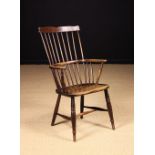 A 19th Century Comb Backed Windsor Armchair.