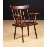A Country Stick Back Armchair.