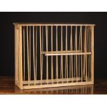 A Pine Spindled Plate Rack 24 ins (61 cms) high, 31 ins (79 cms) wide, 7½ ins (19 cms) deep.