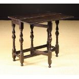 A Small Joined Oak Single Flap Writing Table Circa 1700.