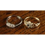 Two Lady's Rings: A 9 carat gold ring set with six diamonds & a sapphire,