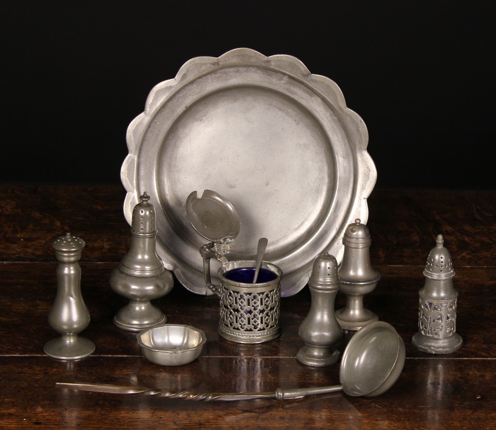 An 18th Century Pewter Plate with scalloped edge,