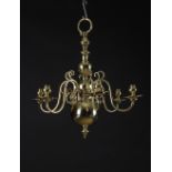 An 18th Century Style Brass Six Branch Chandelier.