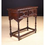 A Late 17th Century High Oak Side/Serving Table of fine colour and patination.