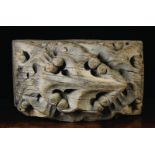 A Large Early 16th Century Oak Ceiling Boss carved with scrolls of Gothic style foliage,