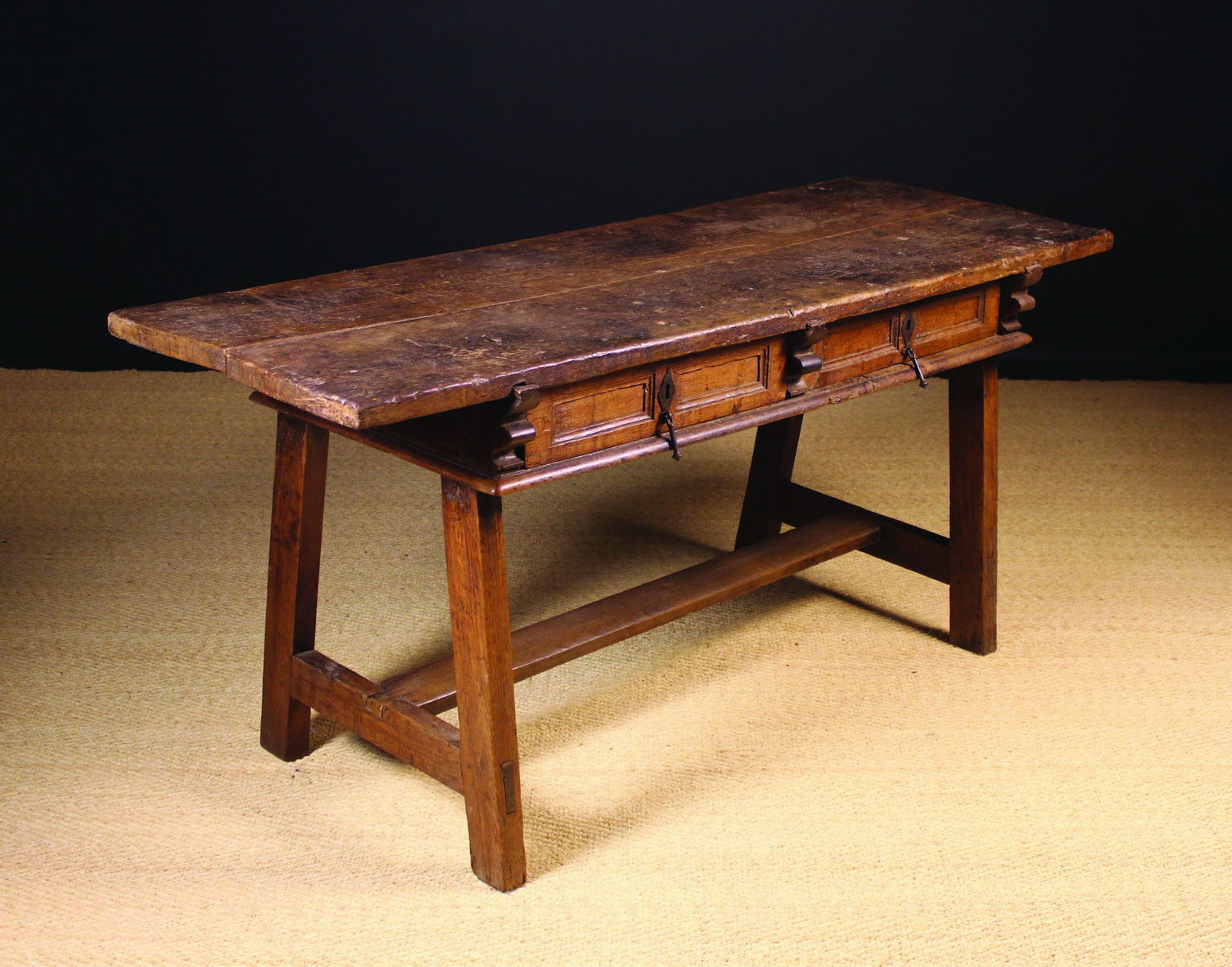 A 17th Century Spanish Two Drawer Table.