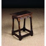 A 17th/Early 18th Century Oak Joint Stool.