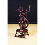 A Late 18th/Early 19th Century Spinning Wheel composed of fine bone & Cuban mahogany turned