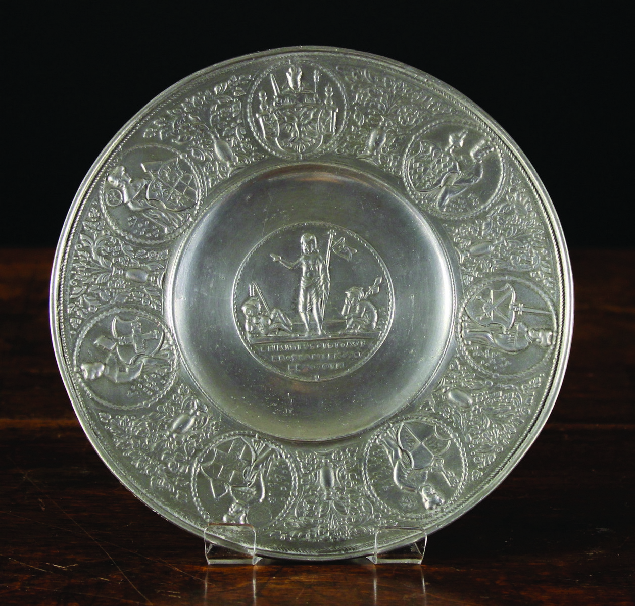 A Copy of The Resurrection Plate cast with Christ Risen to the centre medallion above inscription,