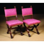 A Pair of 19th Century Carved Walnut Side Chairs in the Renaissance style.