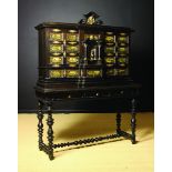 A Large 17th/18th Century Ebony Collector's Cabinet with Painted Ornamentation.