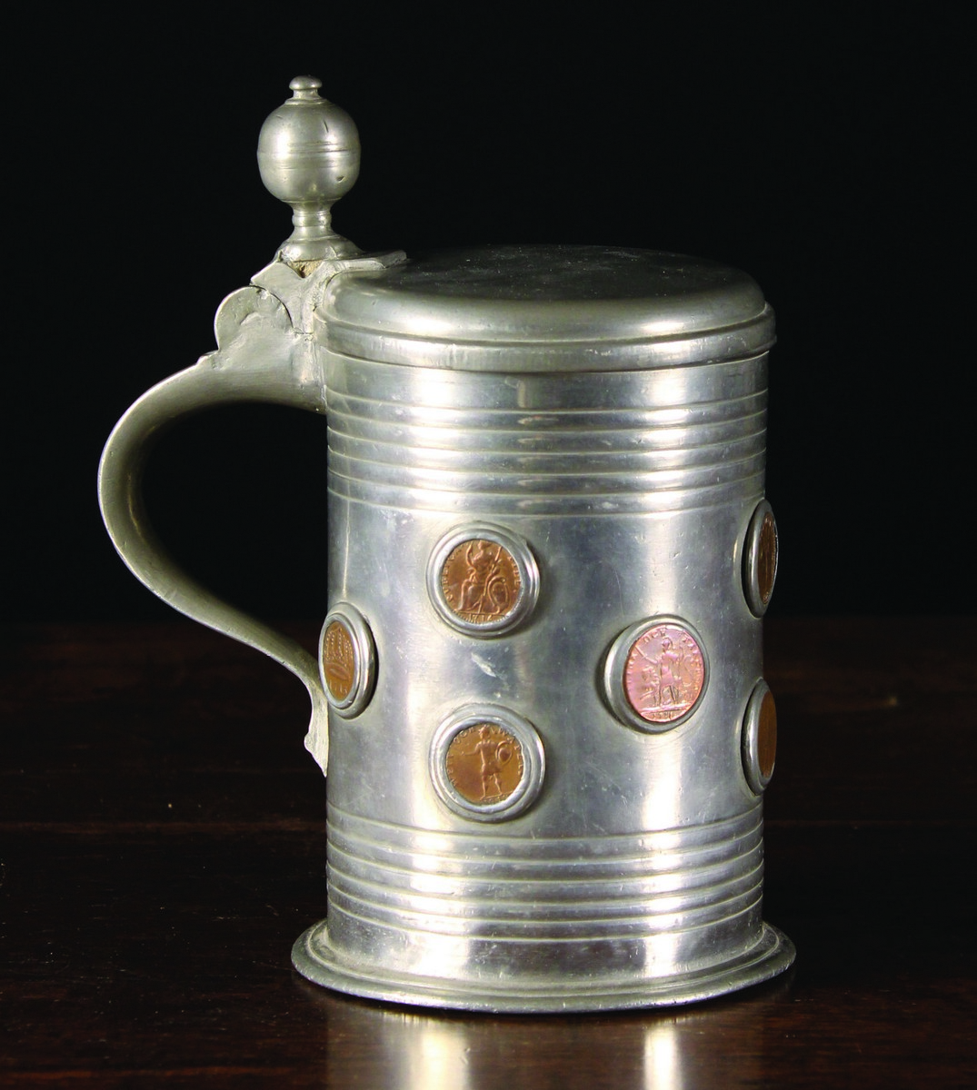 A German Pewter Tankard from Stralsund, with Karl XII emergency coinage applied to the barrel,