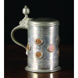 A German Pewter Tankard from Stralsund, with Karl XII emergency coinage applied to the barrel,