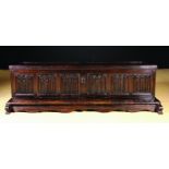 An Early 16th Century & Later Carved Oak Coffer with stepped platform base.