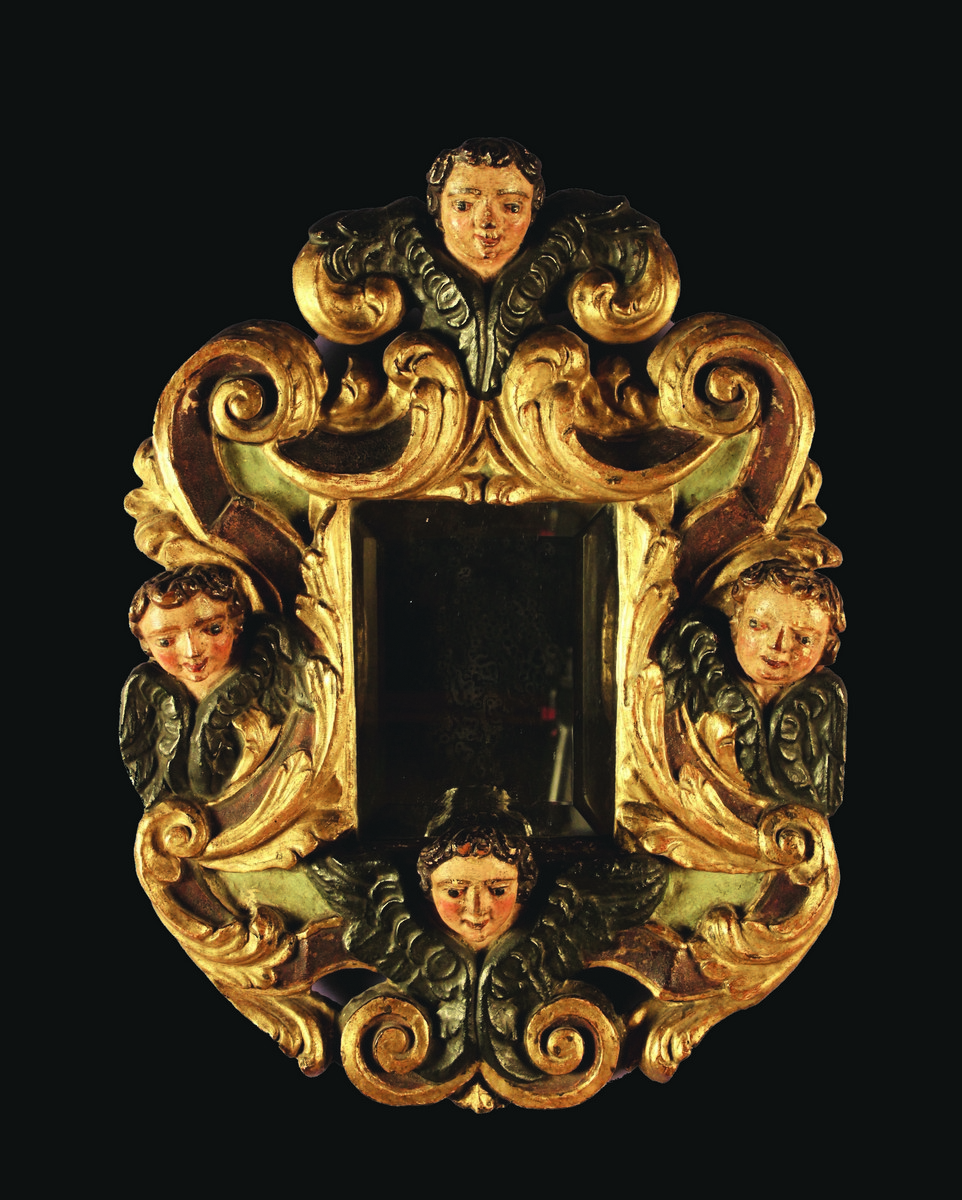 A 17th Century Carved, Polychromed & Gilded Frame containing a rectangular bevelled mirror,