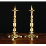 A Pair of 17th Century Flemish Brass Pricket Sticks.